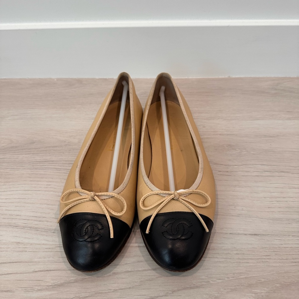 CHANEL Beige and Black Leather Cap-Toe Ballet Flats with Bow